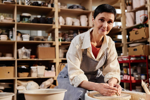 istock Woman Creating Ceramics in Art Studio 2156595394