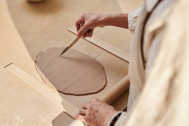 istock Woman Decorating Clay Piece 2156595440