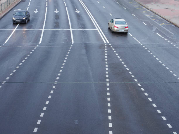 istock Traffic on the road in city. View from above. 2156596379