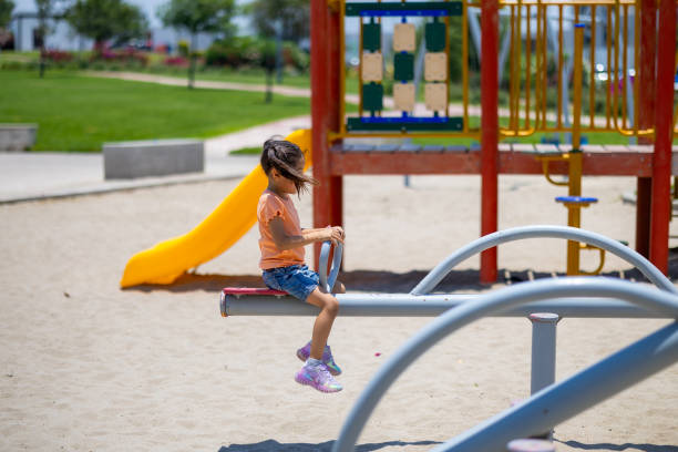 istock Child playing in the park 2156597236