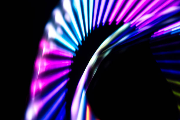 Neon  lights representing fast moving AI technology fiber optic high speed data transfer communication stock image.