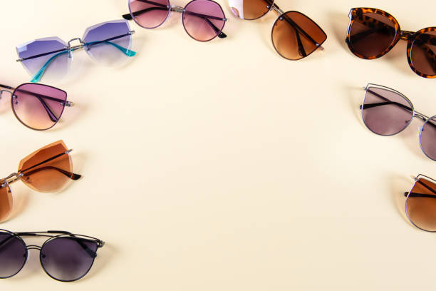 istock Different sunglasses on yellow background. Frame. Summer banner. Copy space. 2156599360