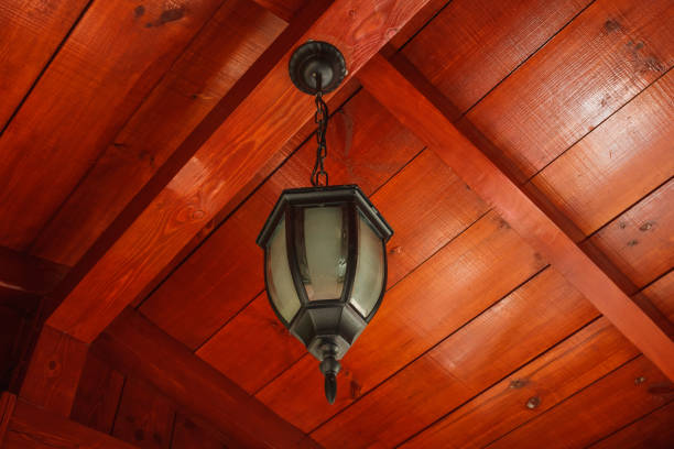 Stylized lantern on the background of a red ceiling