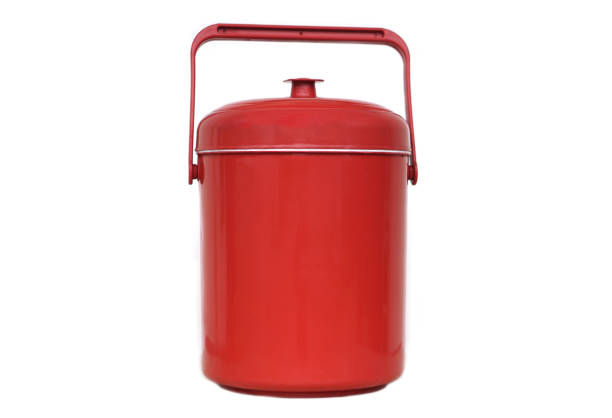 Red plastic bucket cooler. Concept, kitchenware container for keep cool of ice. White background. Concept, kitchenware container for keep cool of ice, prepare for mix in beverages in party or picnic.