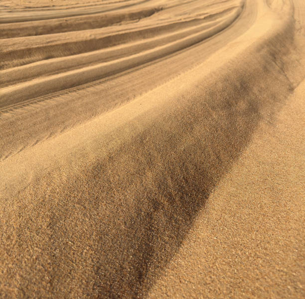 istock Geometric shapes in the sand. 2156604203