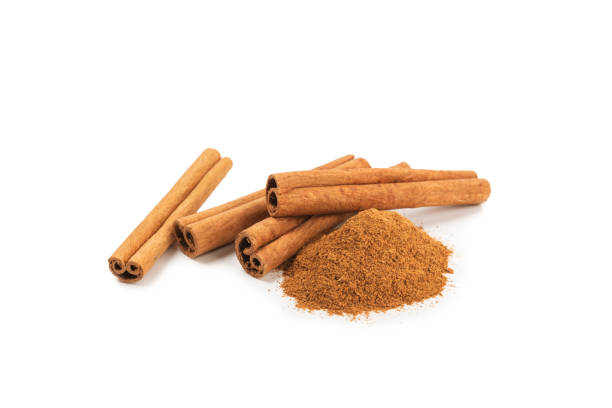 istock Cinnamon sticks on  background. Cinnamon roll. Spicy spice for baking, desserts and drinks. Fragrant ground cinnamon. cinnamon powder Close-up. Place for text. copy space 2156605575