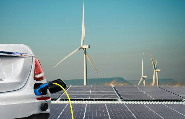istock electric car and clean energy from solar cells 2156606395