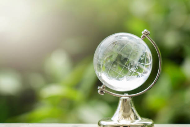 istock Glass Globe with Green Nature Background 2156610922