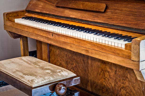 istock Old wooden piano, ready to play 2156611101
