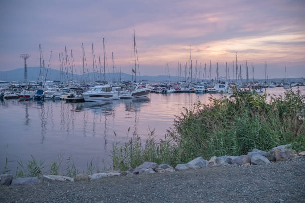 View of a marina after sunset.