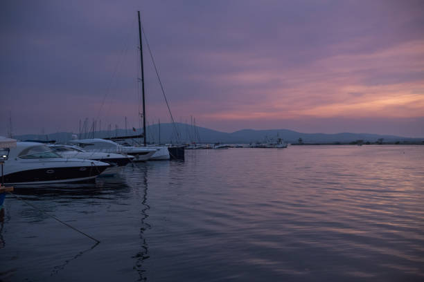 View of a marina after sunset.