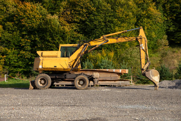 istock There is an old excavator on the road. 2156612305