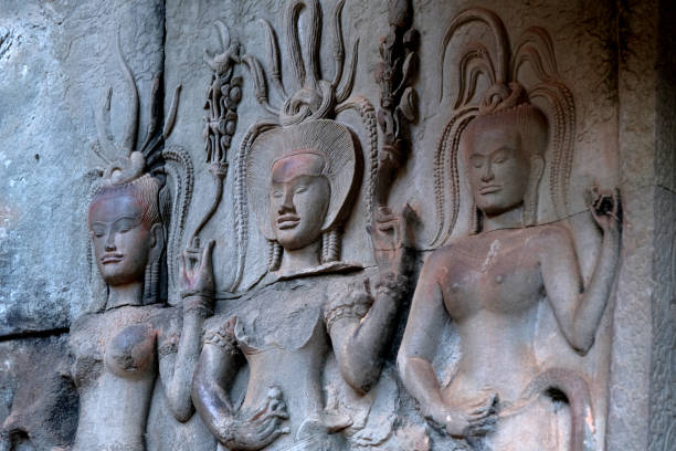 Apsara ancient carvings in Angkor Wat temple, Cambodia. It's the largest religious monument in the world by land area.