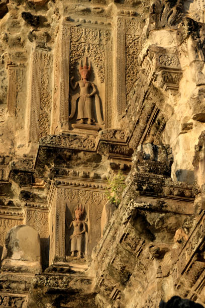 Siem Reap, Cambodia- February 2, 2014: Angkor Wat is a temple complex in the province of Siem Reap, Cambodia originally dedicated to the Hindu god Vishnu in the 12th century CE. It is among the largest religious buildings ever created. Its name means \