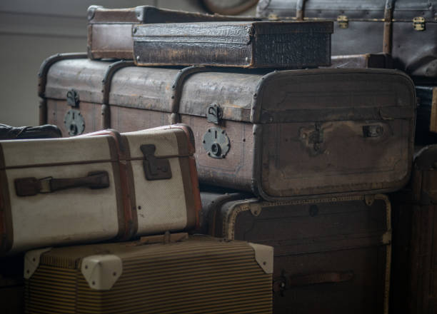 istock the old  suitcases on old-timer car 2156623299
