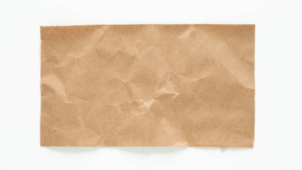 istock Crinkled Brown Paper Sheet Isolated on White Background 2156630871