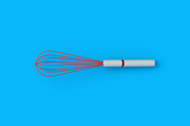 istock Red wire whisk for whipping on blue background. Kitchen utensils. Beater for eggs. Hand mixer. Top view. 3d render 2156638339