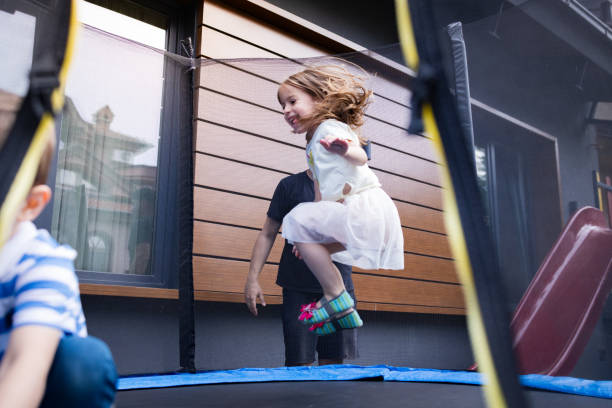 istock Children playing outside their home 2156638480