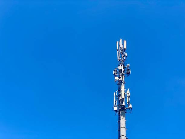 istock Cell tower, blue sky background. 3g, 4g, 5g. Mobile communications, various data transmission systems are installed on one tower. Modern technologies for information transmission. Horizontal photo. 2156638678