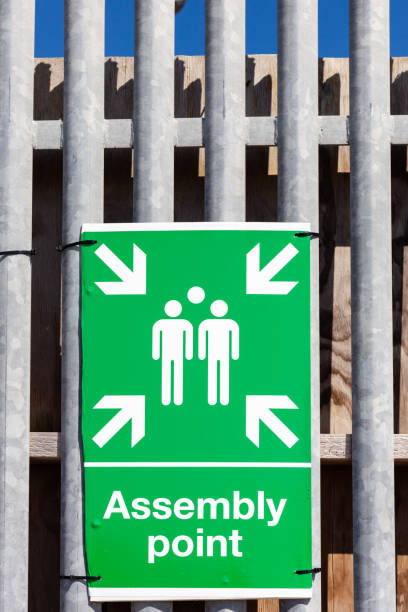 istock Assembly point sign on a fence 2156642393