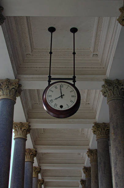 istock Abstract landscape view Mill colonnade from marble with vintage clock in the ceiling. Famous touristic place and romantic travel destination in Karlovy Vary, Czech Republic 2156644881