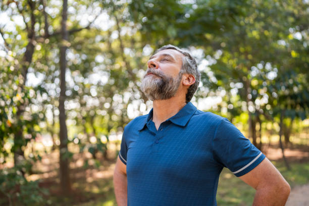 senior man breathing fresh air