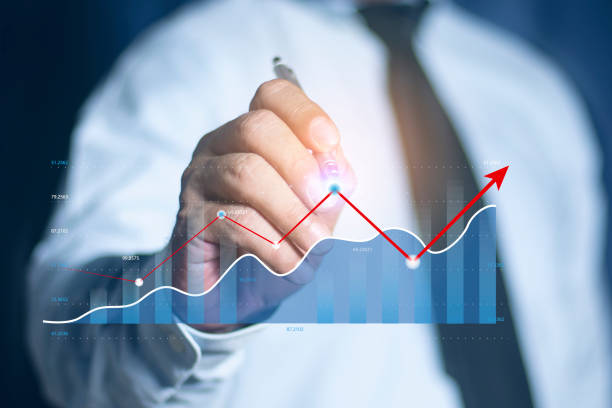 istock Businessman touch visual screen rising arrow, representing business growth. Financial growth chart Investment concept. 2156658884