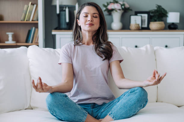 istock Woman meditating in Lotus position. 2156660279
