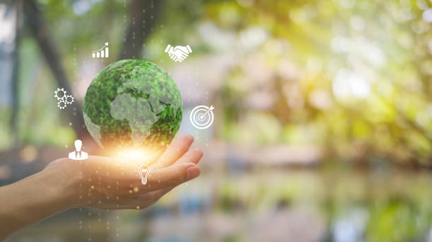 istock Environment concept. Green earth planet in hands with shining light. Save and protection Earth. sustainable and corporation development, green eco friendly. 2156663126