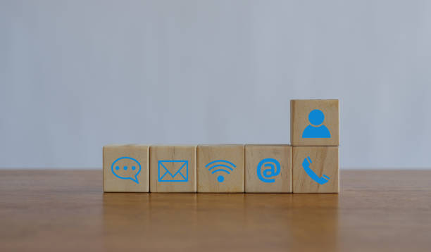 istock Customer support hotline Contact us people connection.Website page contact us or e-mail marketing concept,  Chat message icons. address,call phone, address, Label wood with the email. 2156663172
