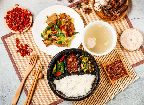 istock twice cooked pork, mice meat, white rice, soup with red chilli, chopsticks and fork served in pot isolated on background side view of taiwanese food 2156664357