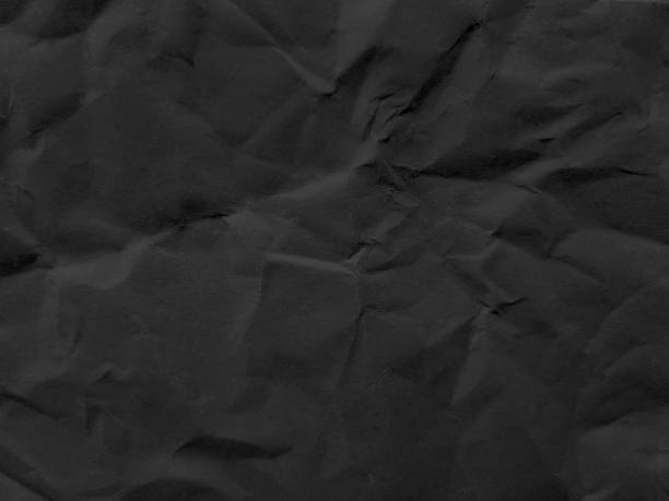 istock Dark black grey paper background creased crumpled surface / Old torn ripped posters scary grunge textures backdrop 2156664367