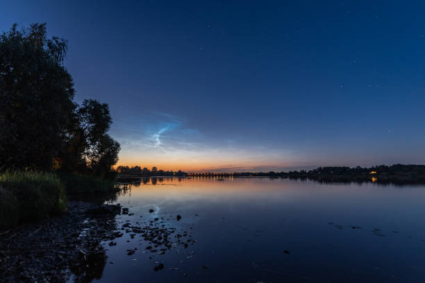 istock Noctilucent clouds over the Daugava river in Latvia on June night 2156664988