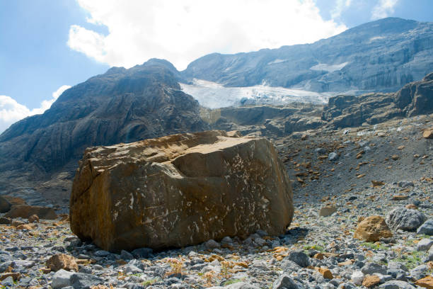 erratic stone bloks left by the action of a receding glacier. Mount Perdú glacier in Pyrenees. Huesca, Spain