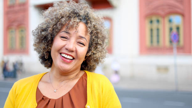istock Smiling woman enjoying her walk 2156667885