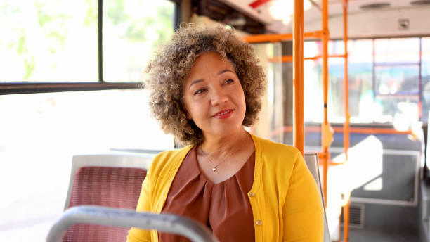 istock Woman enjoying a bus ride 2156668110