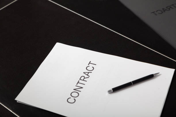 istock Contract and pen lie in transparent box 2156669963