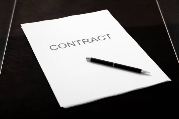 istock Contract and pen lie in transparent box 2156670023