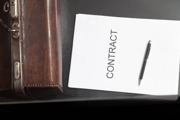 istock Contract and leather carpetbag close-up 2156670032