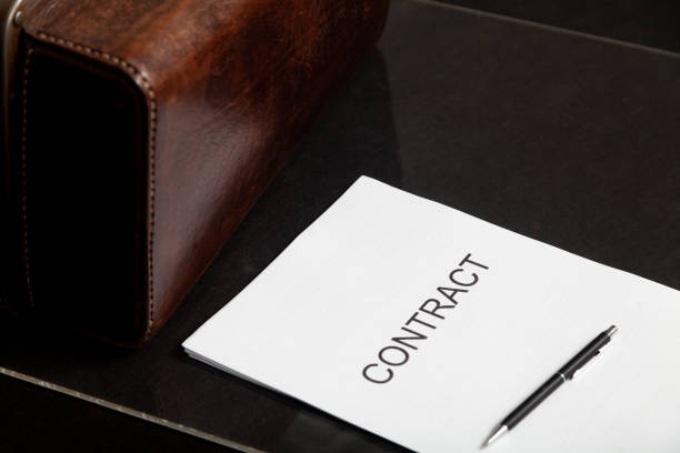 istock Contract and leather carpetbag close-up 2156670052