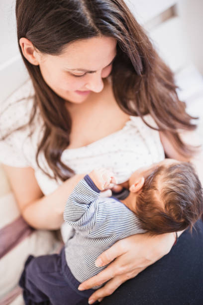 istock Mother Breastfeeding Her Baby 2156680160