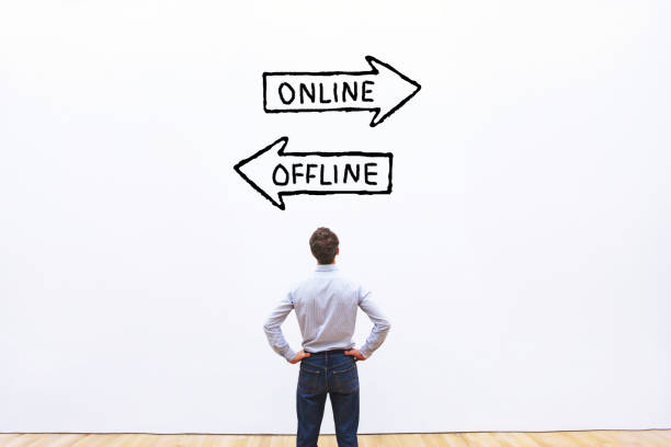 istock online vs offline business concept 2156681956