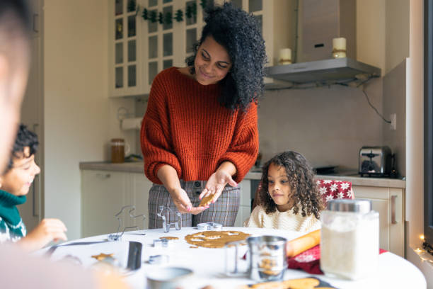 istock Family Baking Together in Cozy Kitchen 2156698028