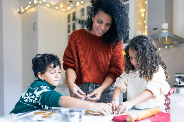 istock Holiday Family Baking in Cozy Kitchen 2156698033