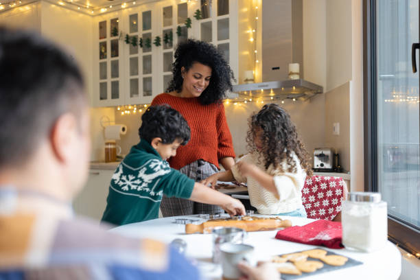 istock Family Baking Together in Cozy Winter Kitchen 2156698036