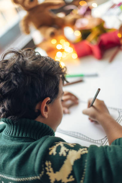 istock Child Drawing During Cozy Winter Afternoon 2156698093