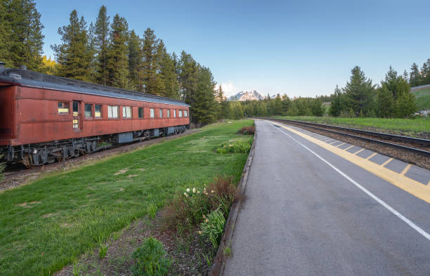 istock Train Tracks and Historic Train Car at Lake Louise 2156703152