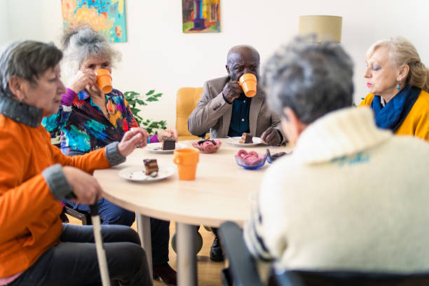 istock A diverse group of pensioners enjoying refreshments together 2156703704