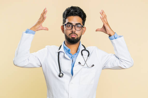 istock Excited amazed doctor man showing head explosion gesture, solution, inspiration, success brainstorm 2156703712