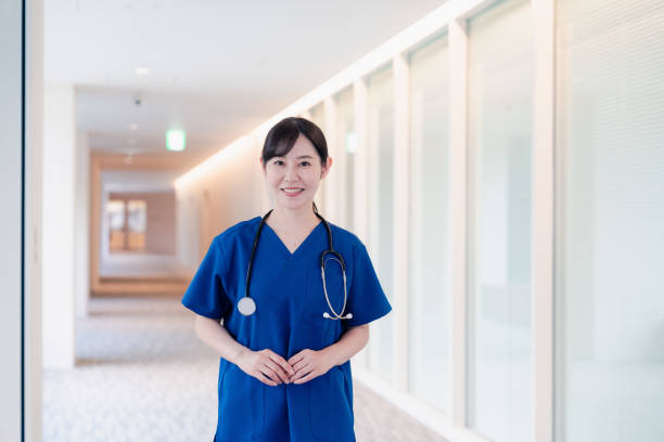 istock Doctor walking through a beautiful hospital. 2156707435